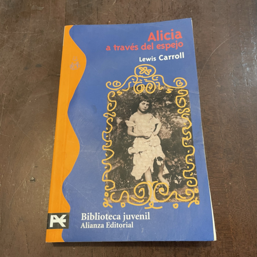 Portada del libro de Alicia a través del espejo (leer descripción!)