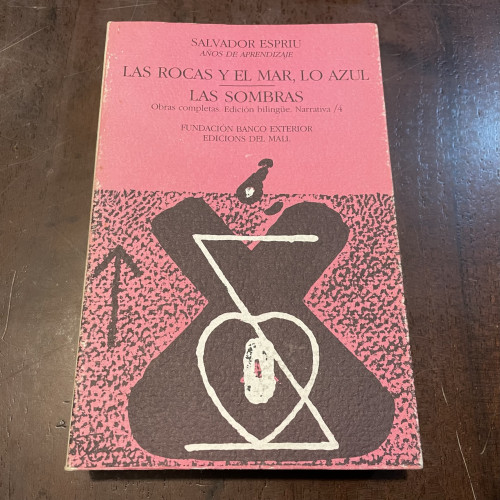 Portada del libro de Las rocas y el mar, lo azul. Las sombras. Edición bilingüe